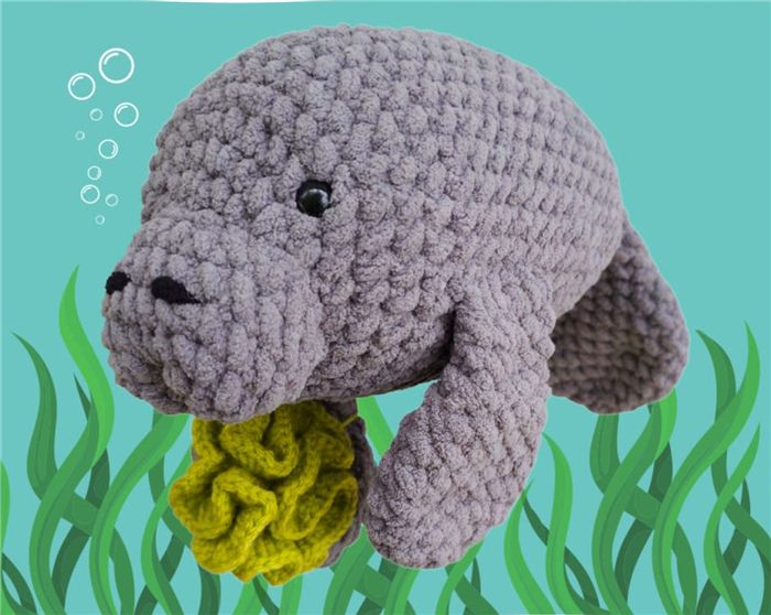 A crocheted manatee made from a pattern imported into Wovely